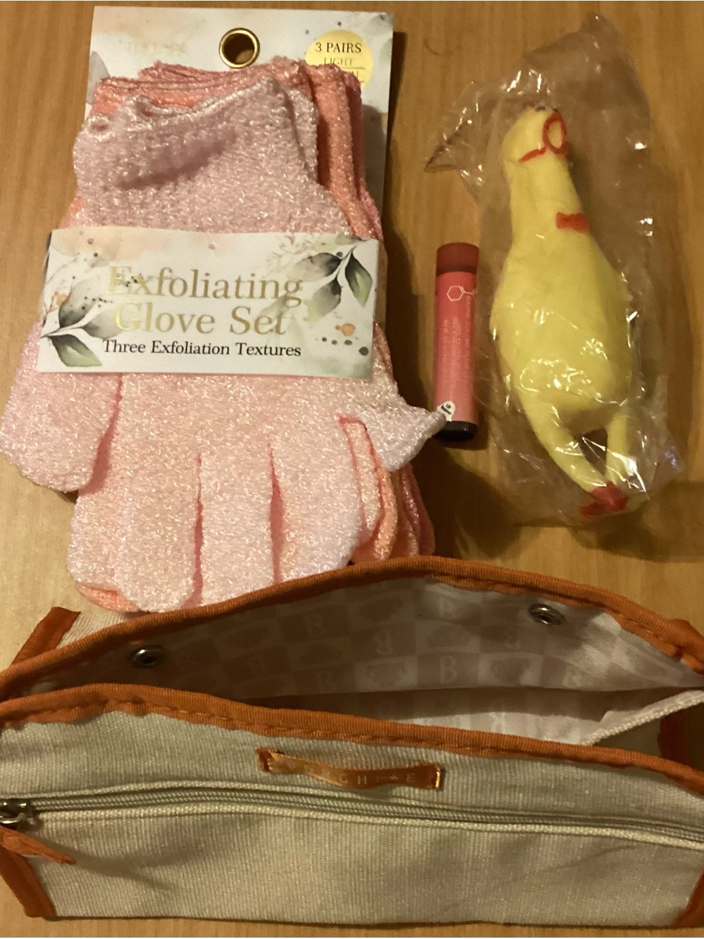 Borghese cosmetic case w/Exfoliating Gloves, BurtsBalm & Chicken in Lisbon tote - Picture 3 of 8